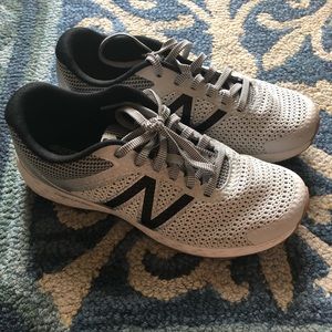 New Balance white and black sneakers